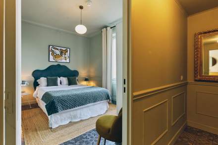Suite Prestige — 65 m² — chambre principale, lit queen-size (160 cm)